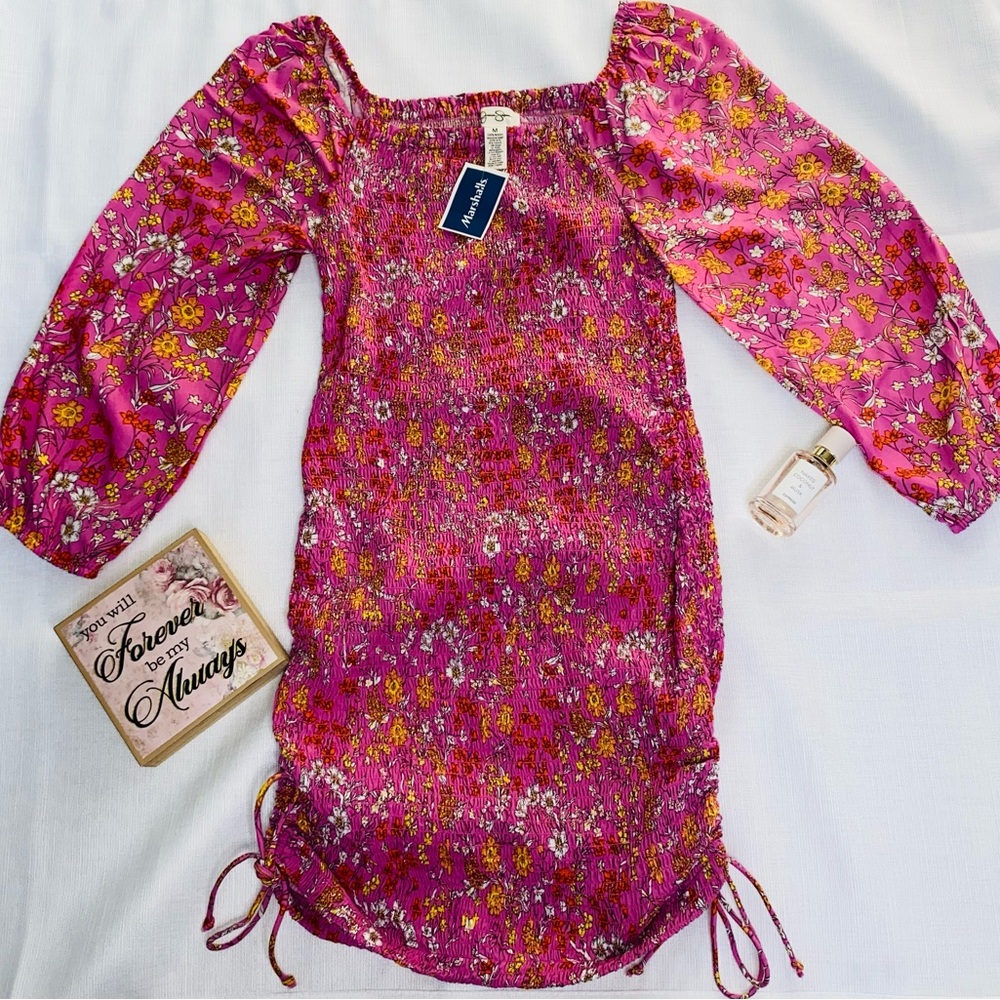 Floral mini dress/adjustable with side ties.